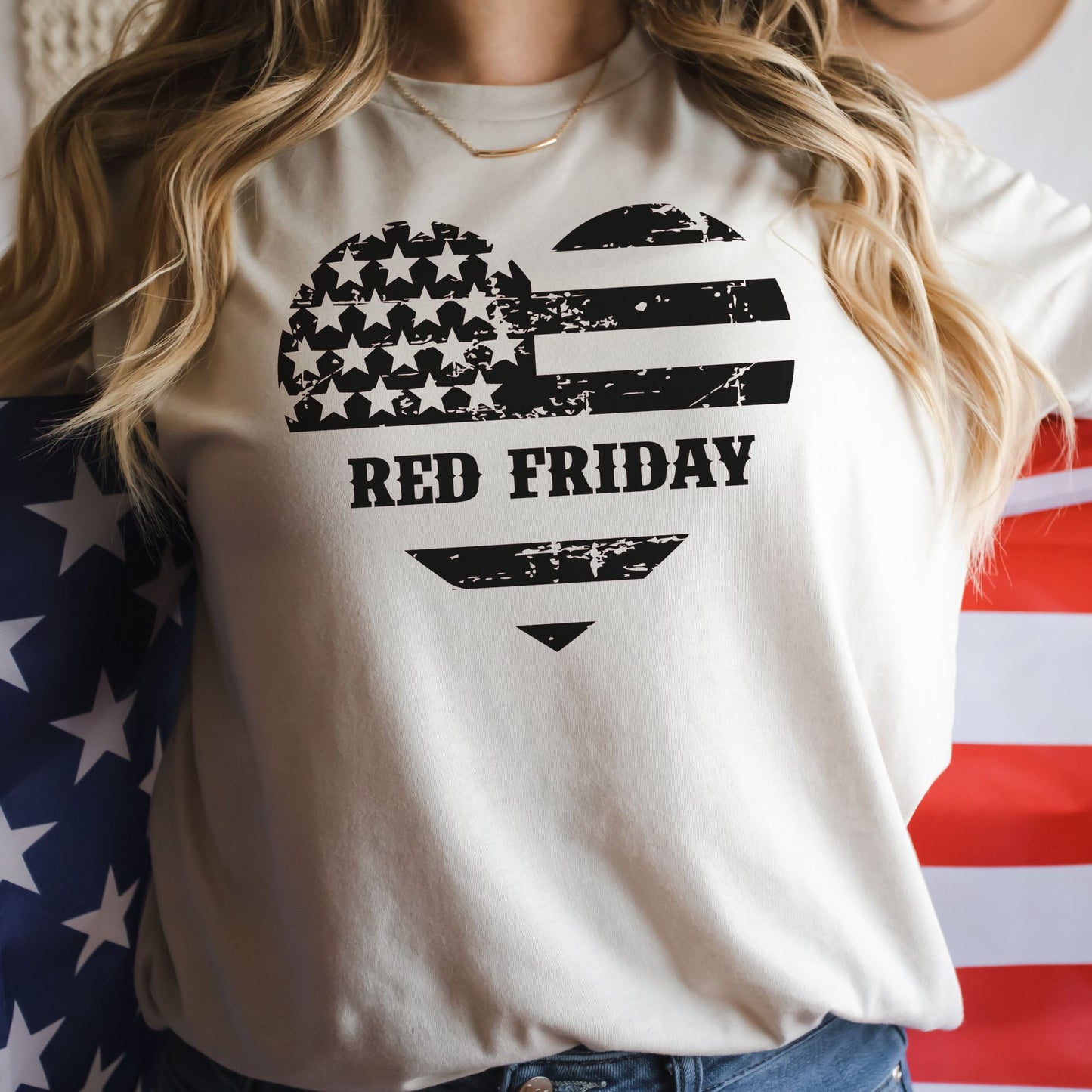 Distressed flag heart with 'Red Friday' on natural cotton women's t-shirt, modeled with flag.