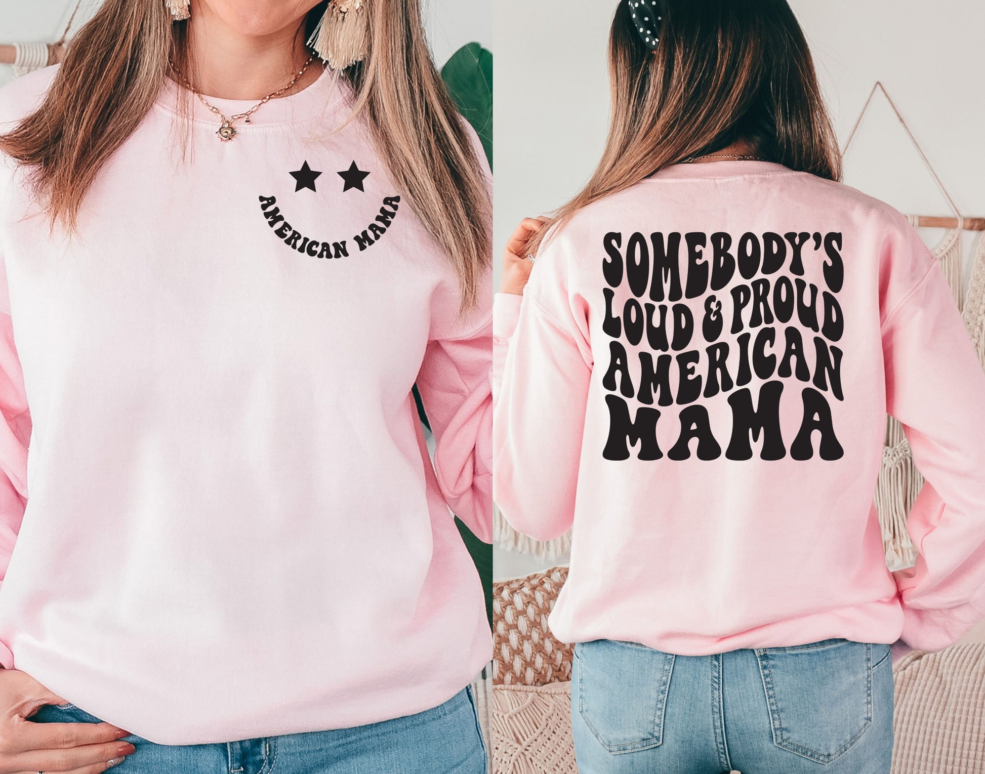 Pink crewneck with American Mama stars front and loud & proud back print, modeled in cozy indoor space.