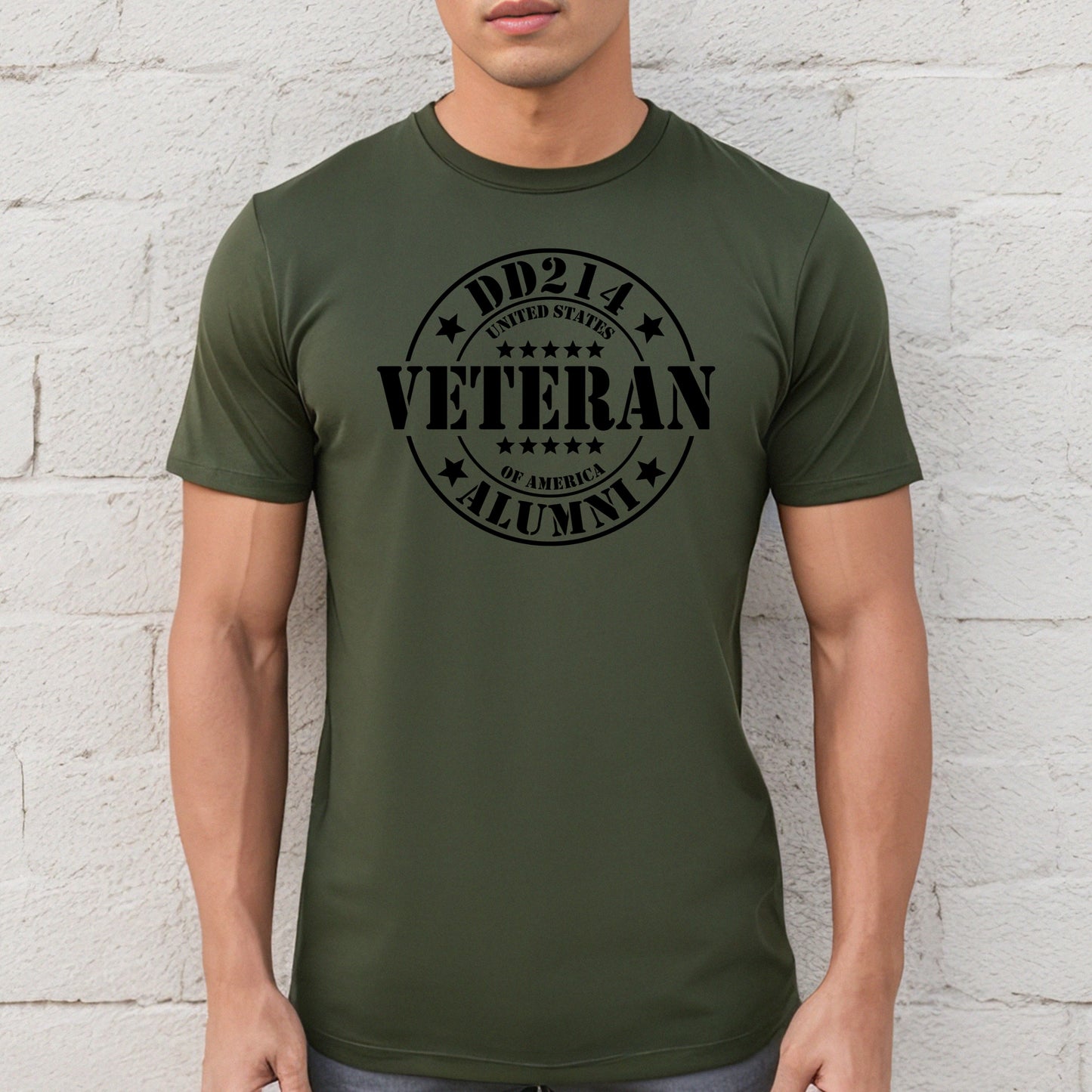 DD214 Veteran Alumni circle stamp on military green performance t-shirt, modeled against white wall.