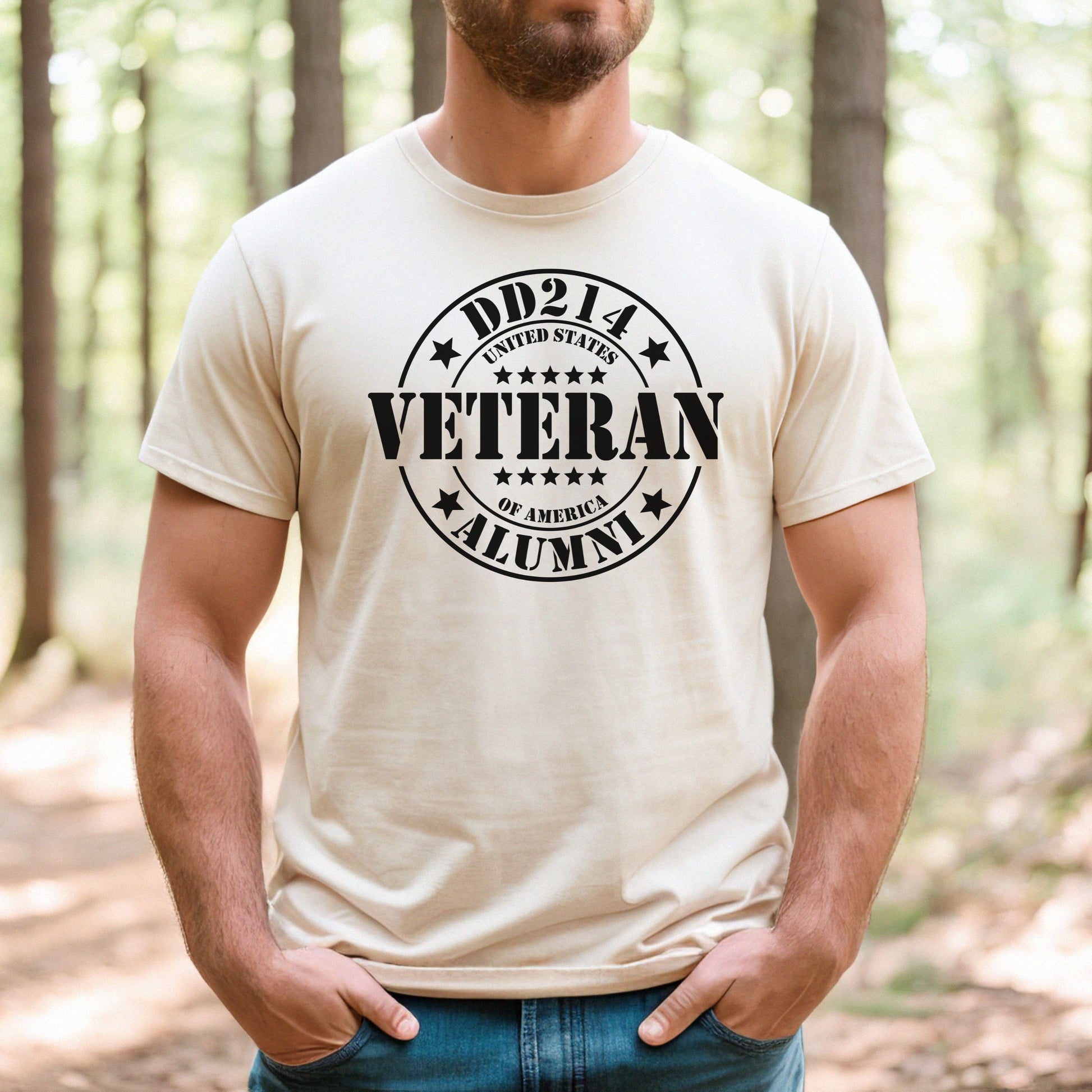 United States DD214 Veteran Alumni stamp on natural men's t-shirt, modeled in sunny forest.