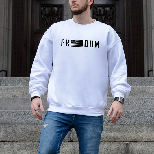 Freedom flag design on white unisex crewneck sweatshirt, modeled on courthouse steps.